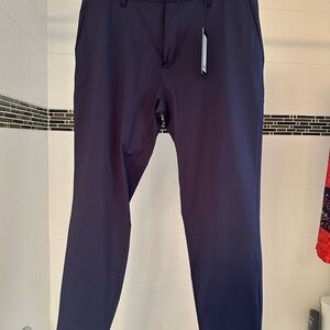 Brand new never worn Rhone Commuter Jogger size 32 Dark Blue